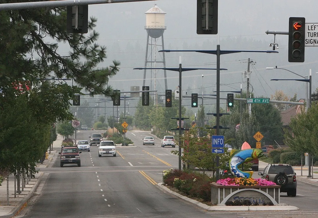 Spokane Street at Fourth Avenue in Post Falls, Idaho, with the Post Falls water tower in view.